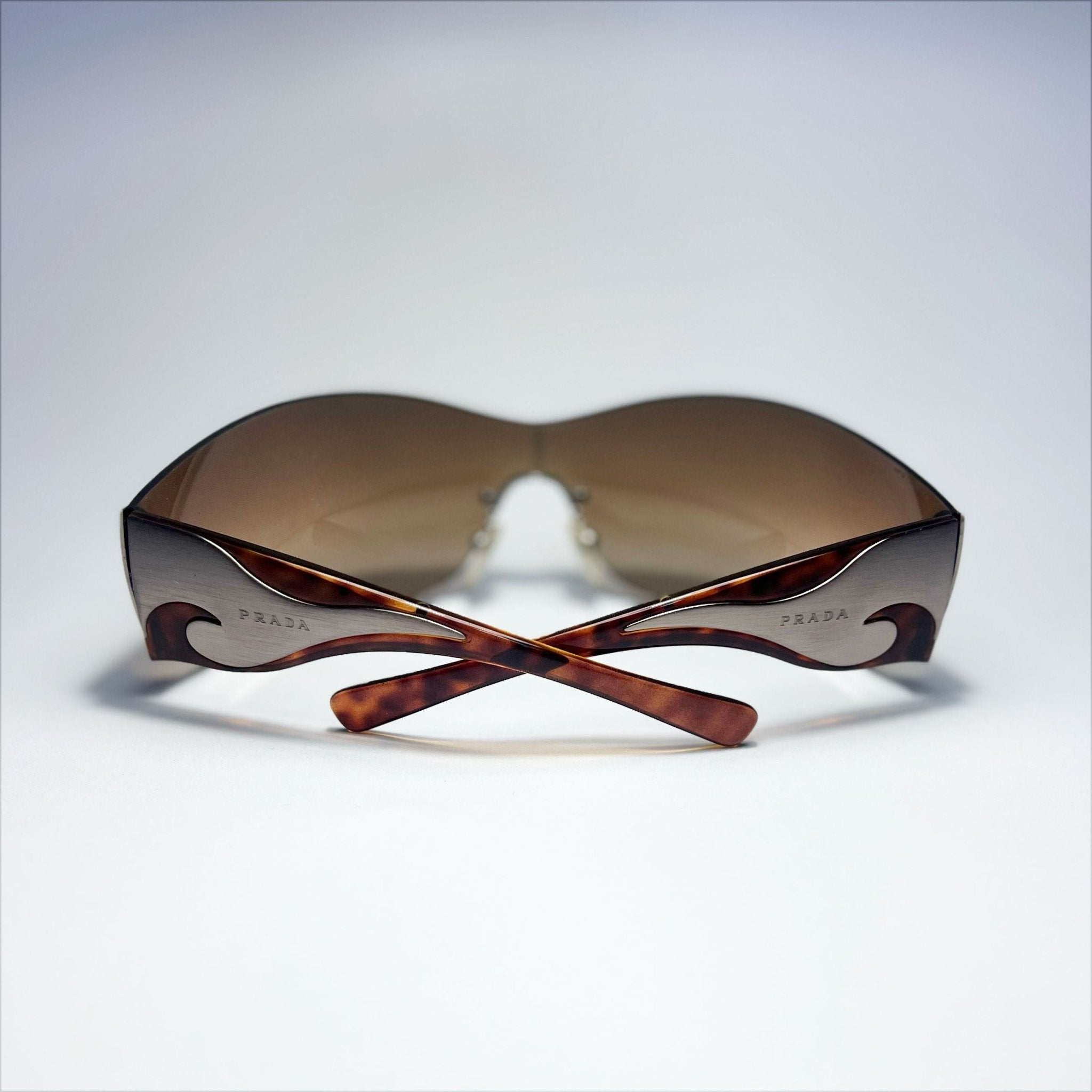 00's Prada Shield Sunglasses with Silver Flame Detail in 00's Prada Shield Sunglasses with Silver Flame Detail in