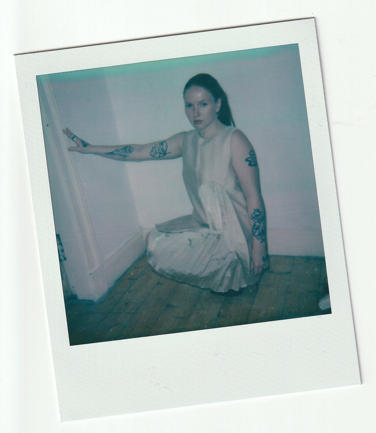 Bel wears AW 2009 Miu Miu Pleated Dress with Cut Out Detail