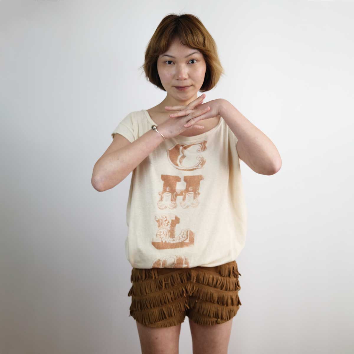 00's Faux Suede Hot Pant Shorts with Fringe Detaling in Tan - W30"