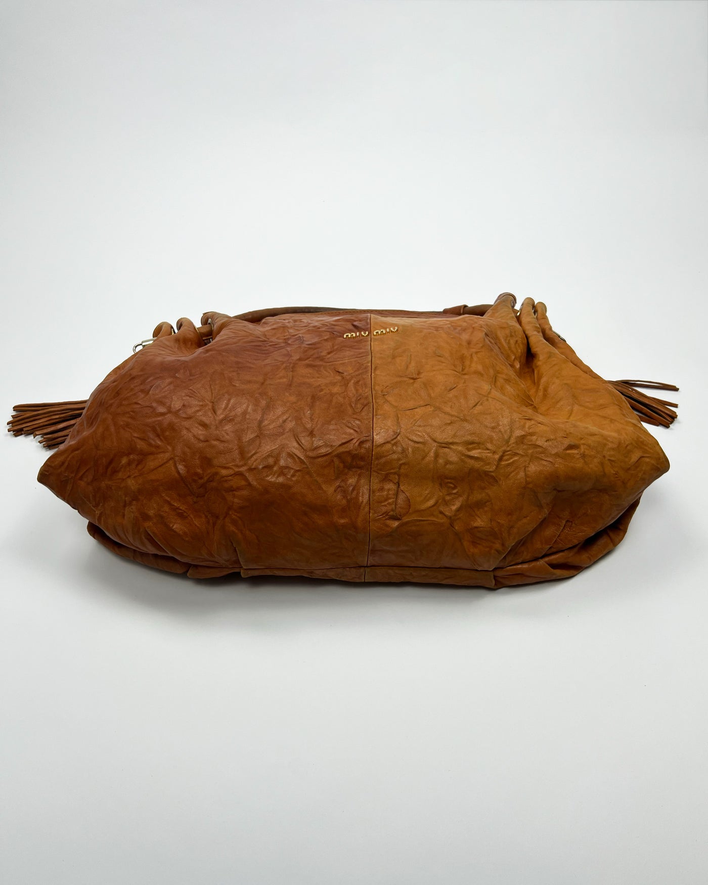 00's Miu Miu Leather Hobo Bag with Tassels in Tan