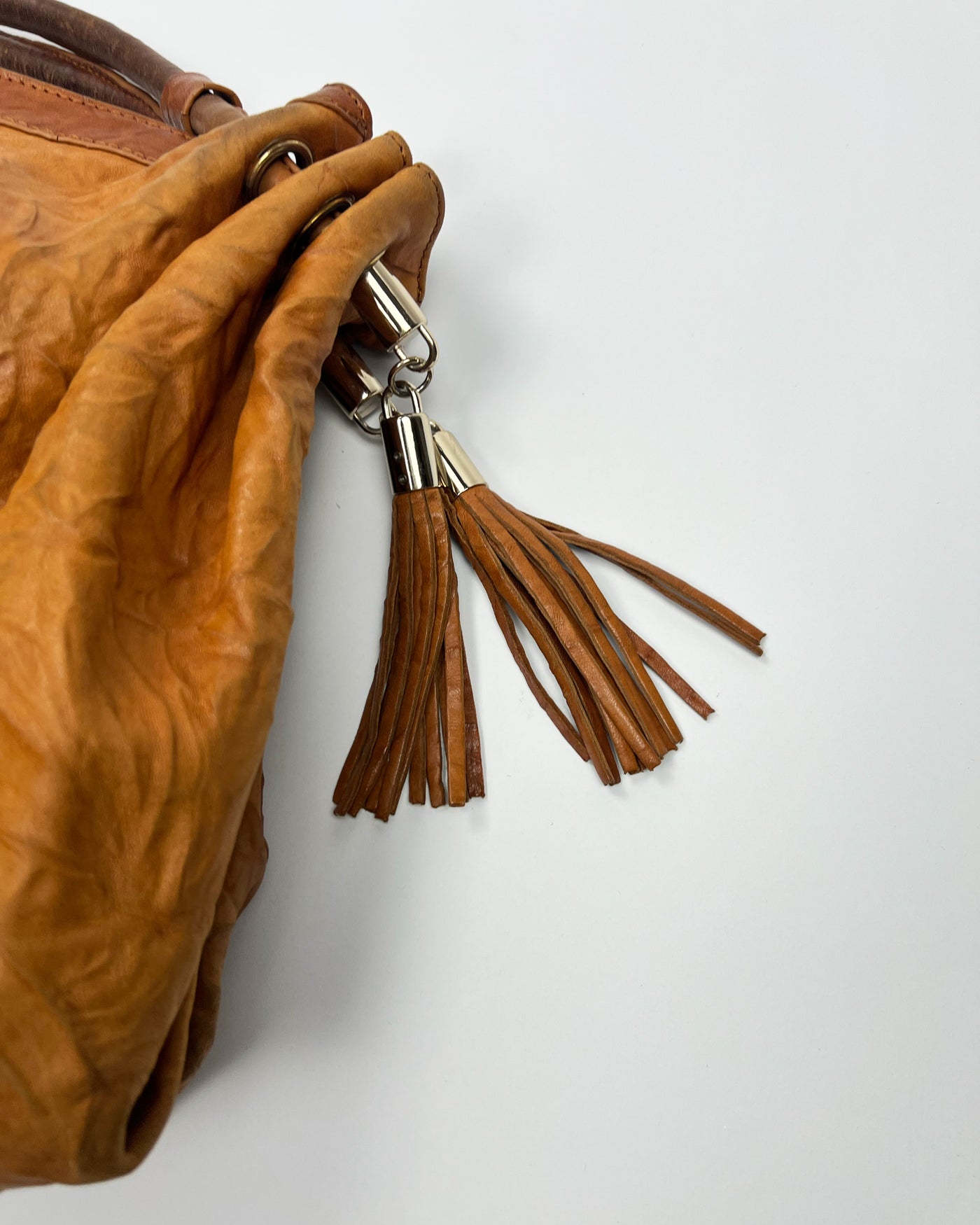 00's Miu Miu Leather Hobo Bag with Tassels in Tan