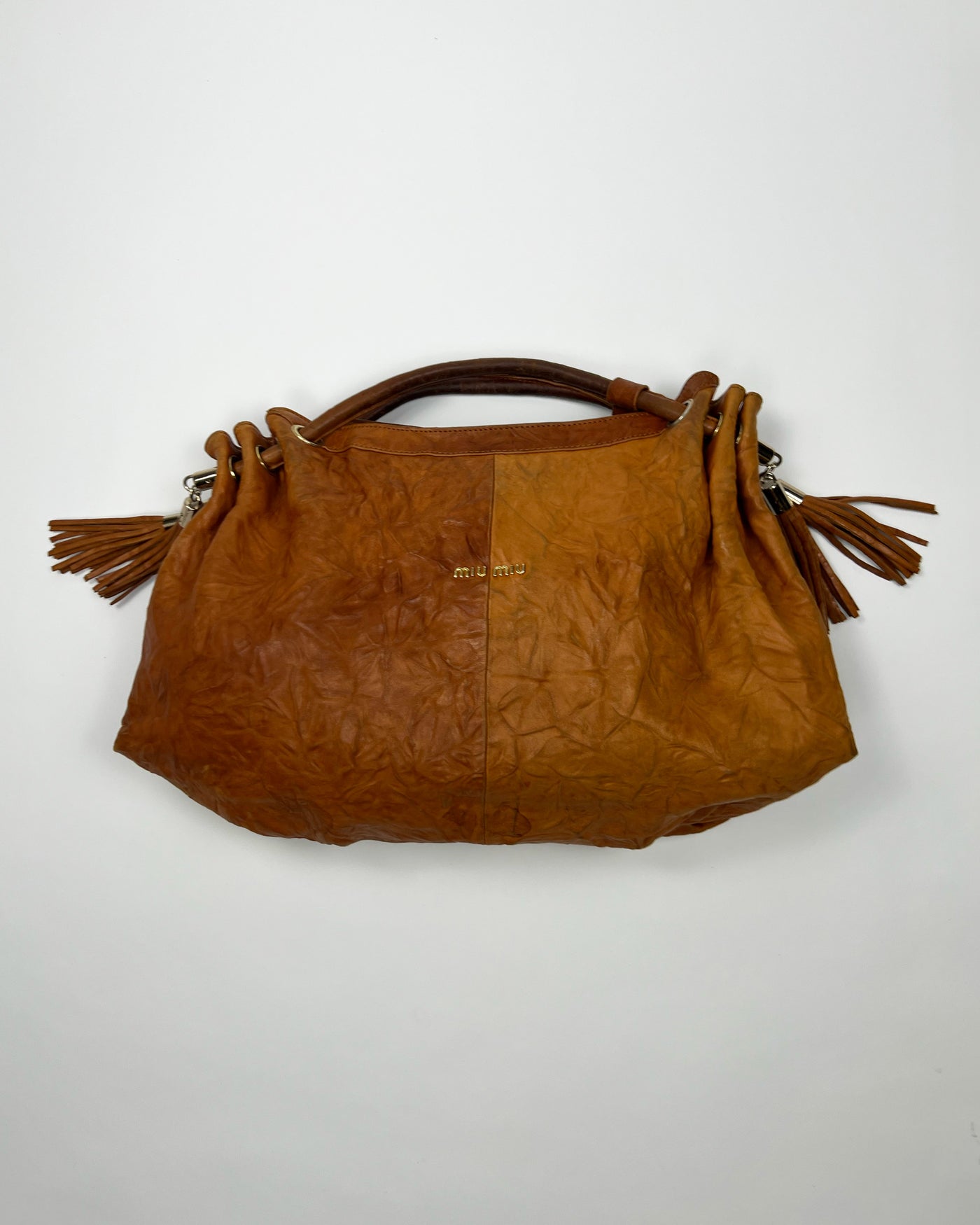 00's Miu Miu Leather Hobo Bag with Tassels in Tan