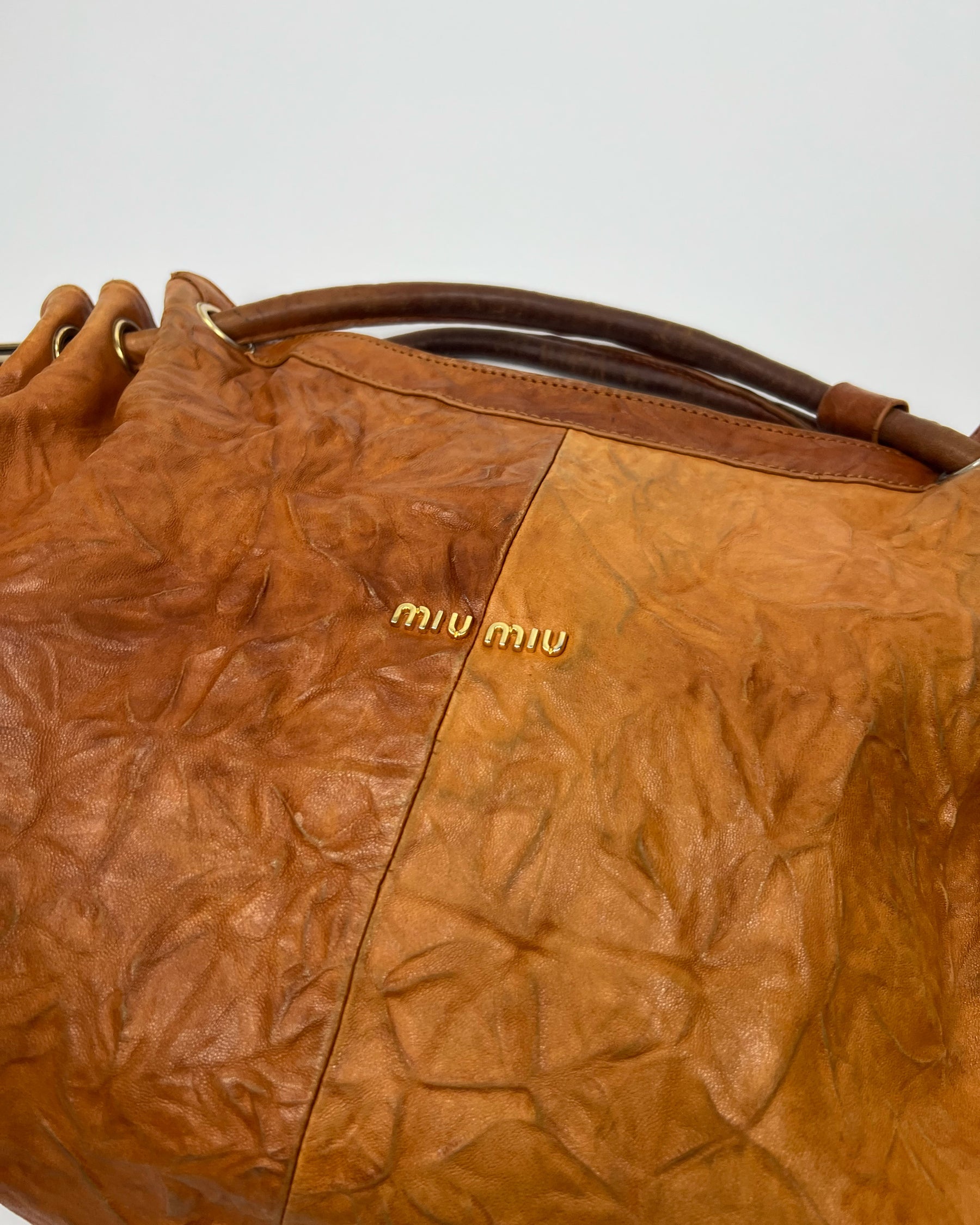 00's Miu Miu Leather Hobo Bag with Tassels in Tan