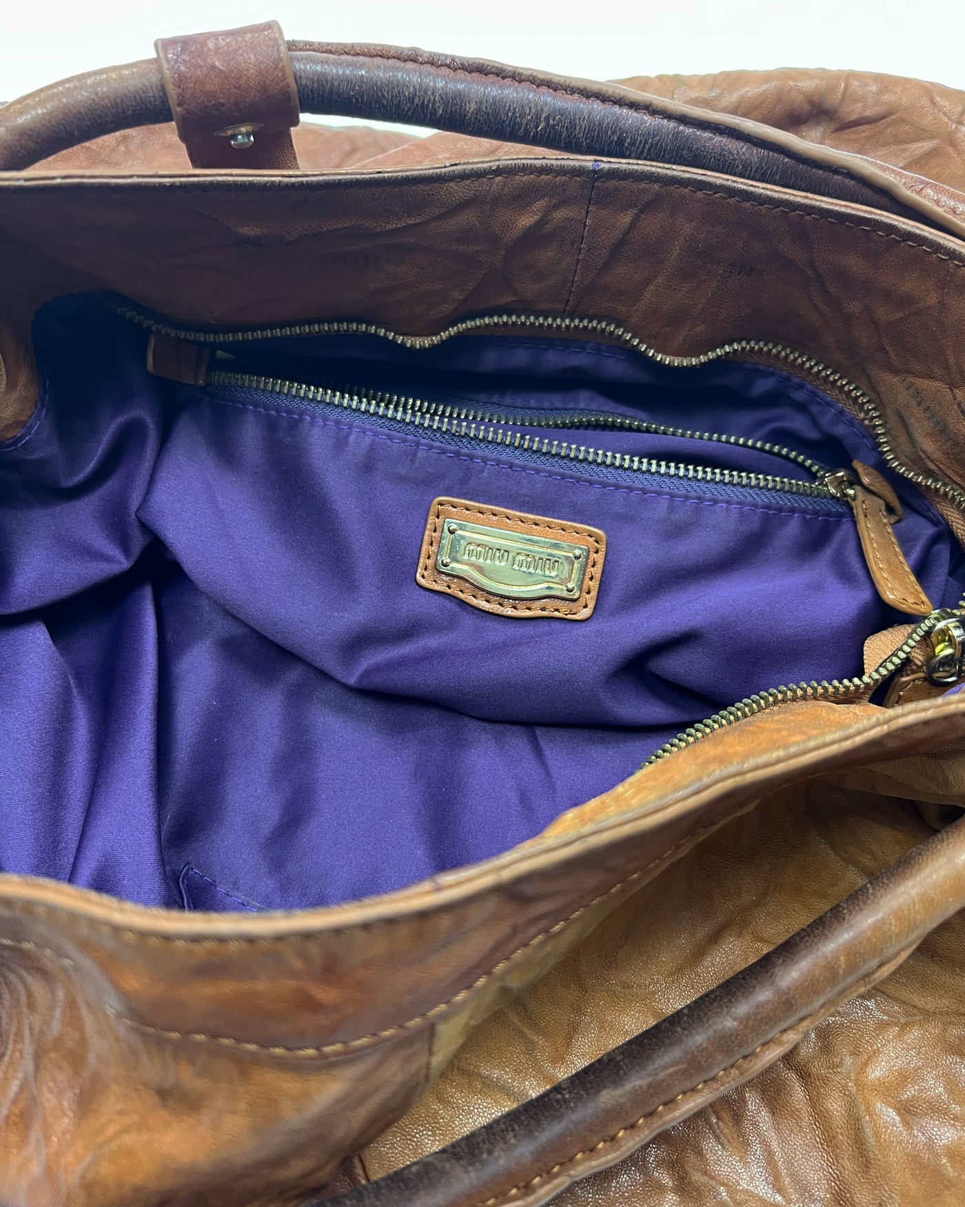 00's Miu Miu Leather Hobo Bag with Tassels in Tan