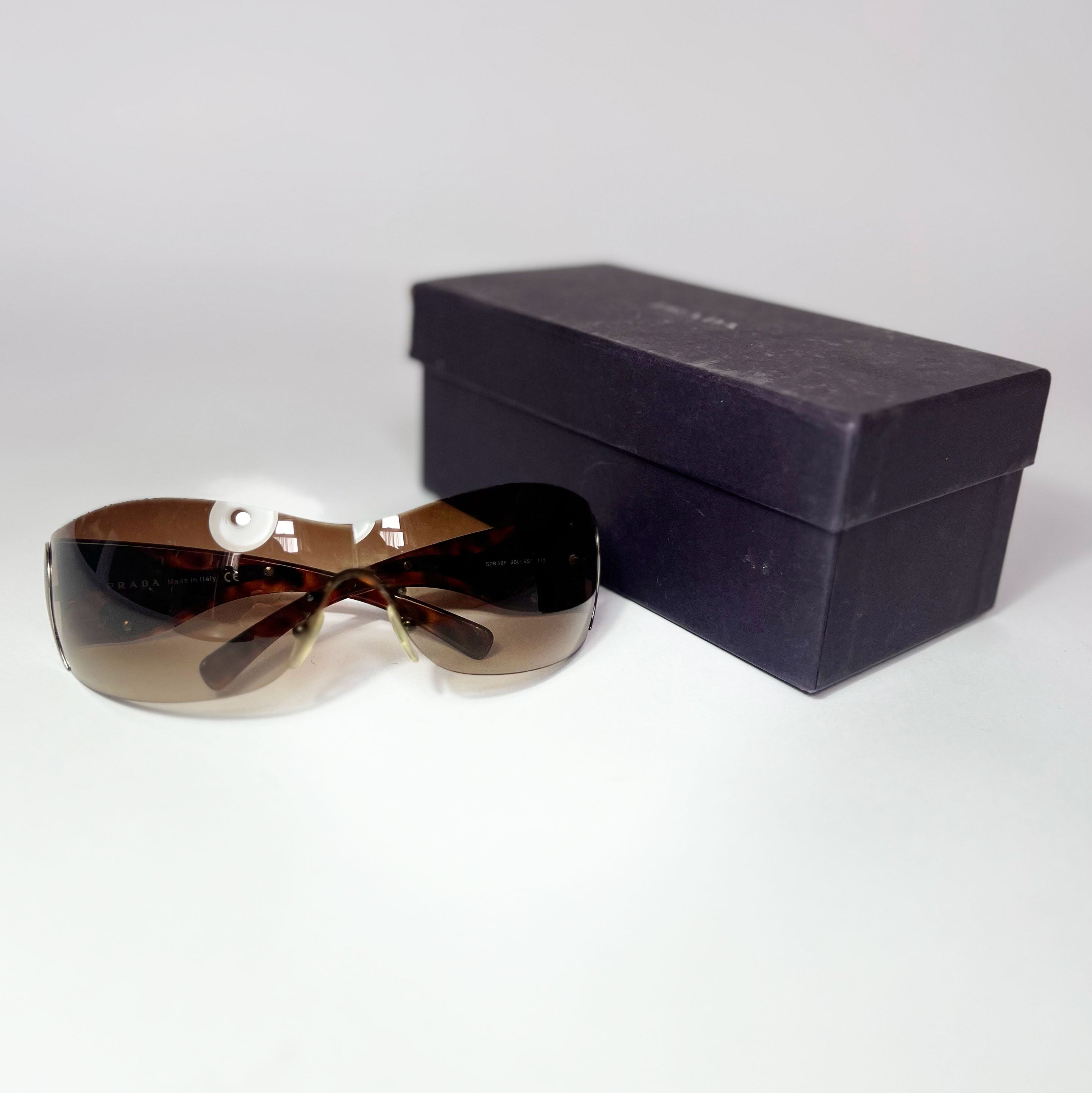 Prada shield sunglasses hot sale